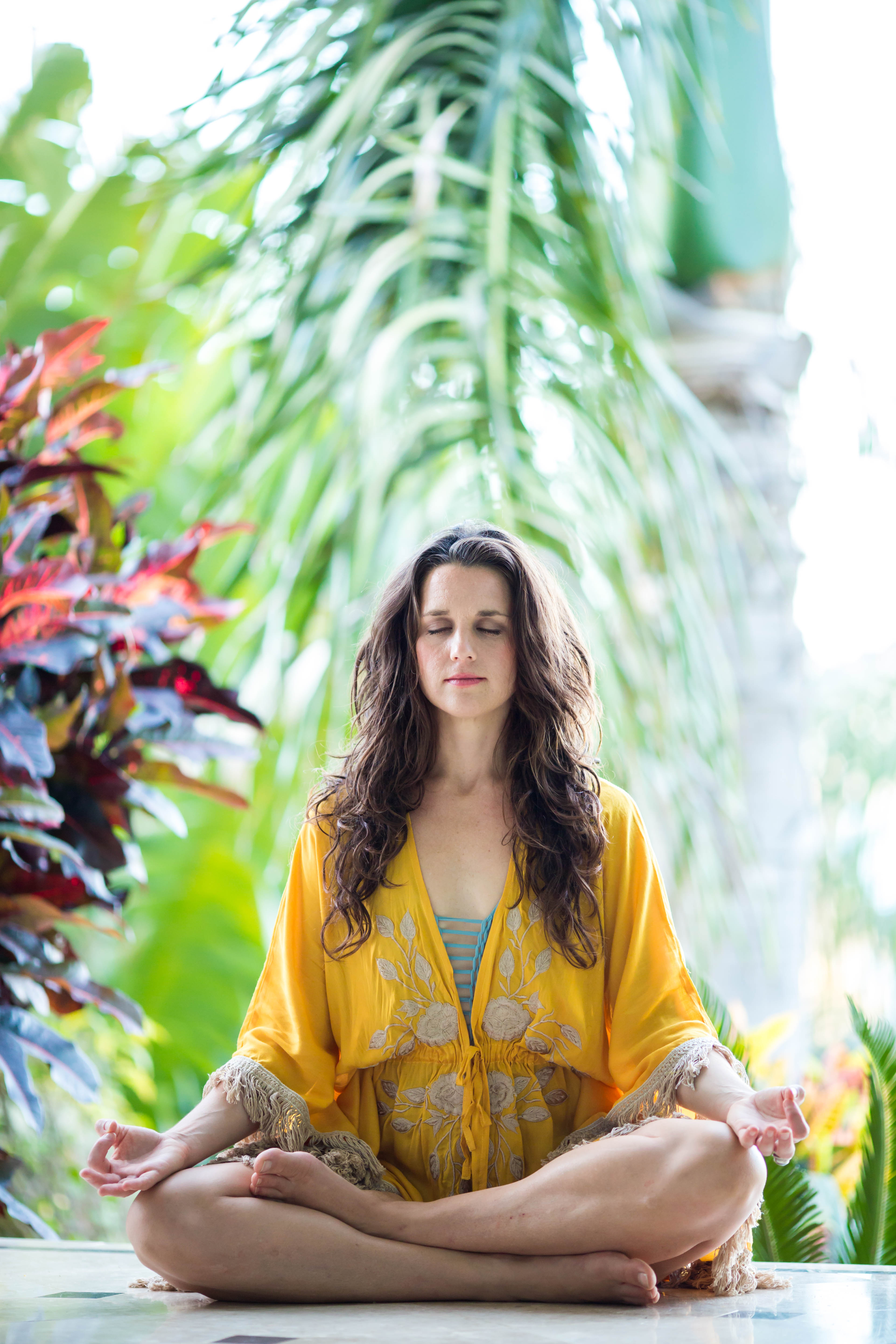 Meredith Milton meditating outdoors — mindfulness practice for food freedom